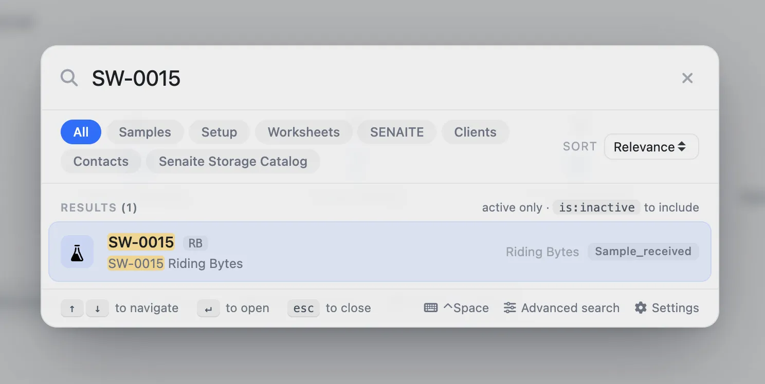 Spotlight overlay searching for SW-0015. Catalog scope chips (All, Samples, Setup, Worksheets, SENAITE, Clients, Contacts, Senaite Storage Catalog) sit above a single Sample result for Riding Bytes with a sample_received tag. A footer hint reads 'active only · is:inactive to include'.
